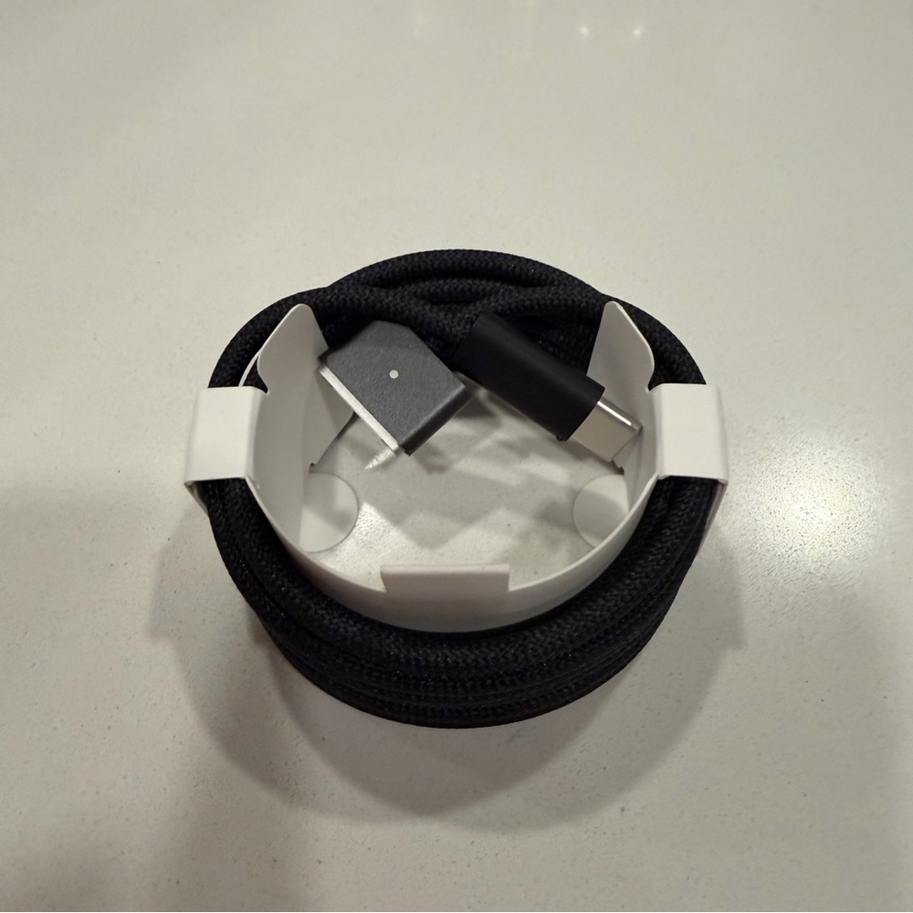 Apple USB-C to MagSafe 3 Cable in black. MacBook charger